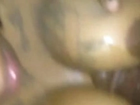 Black beauty gets her big tits massaged